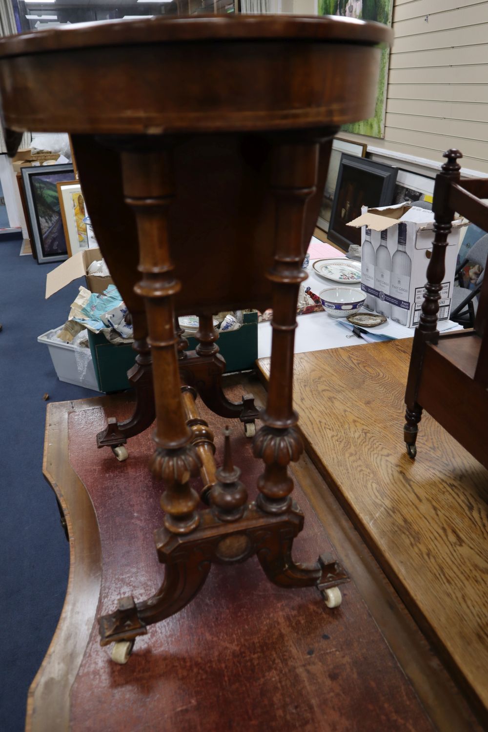 A Victorian inlaid walnut work table, with oval top, width 60cm